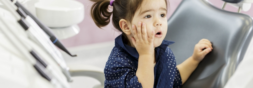 Little girl in a dental chair