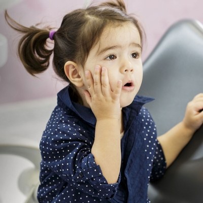 Little girl on dental chair