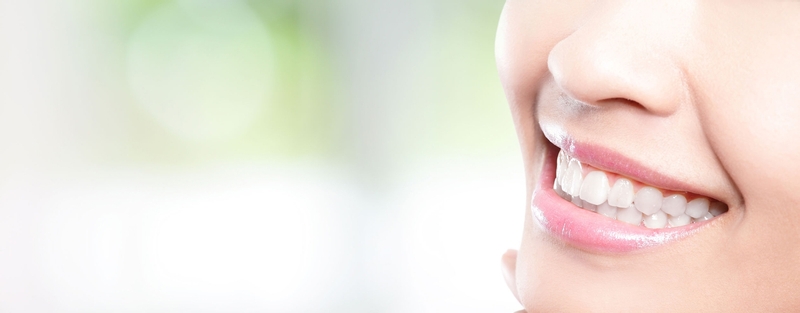 Smiling woman with white teeth