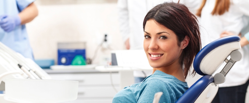 Woman sitting in a dental chair