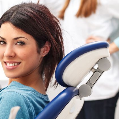 Woman sitting in a dental chair
