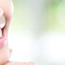 close-up of a smiling woman's teeth