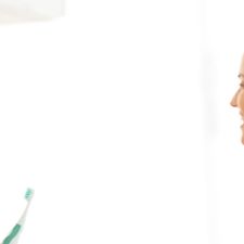 young woman brushing her teeth